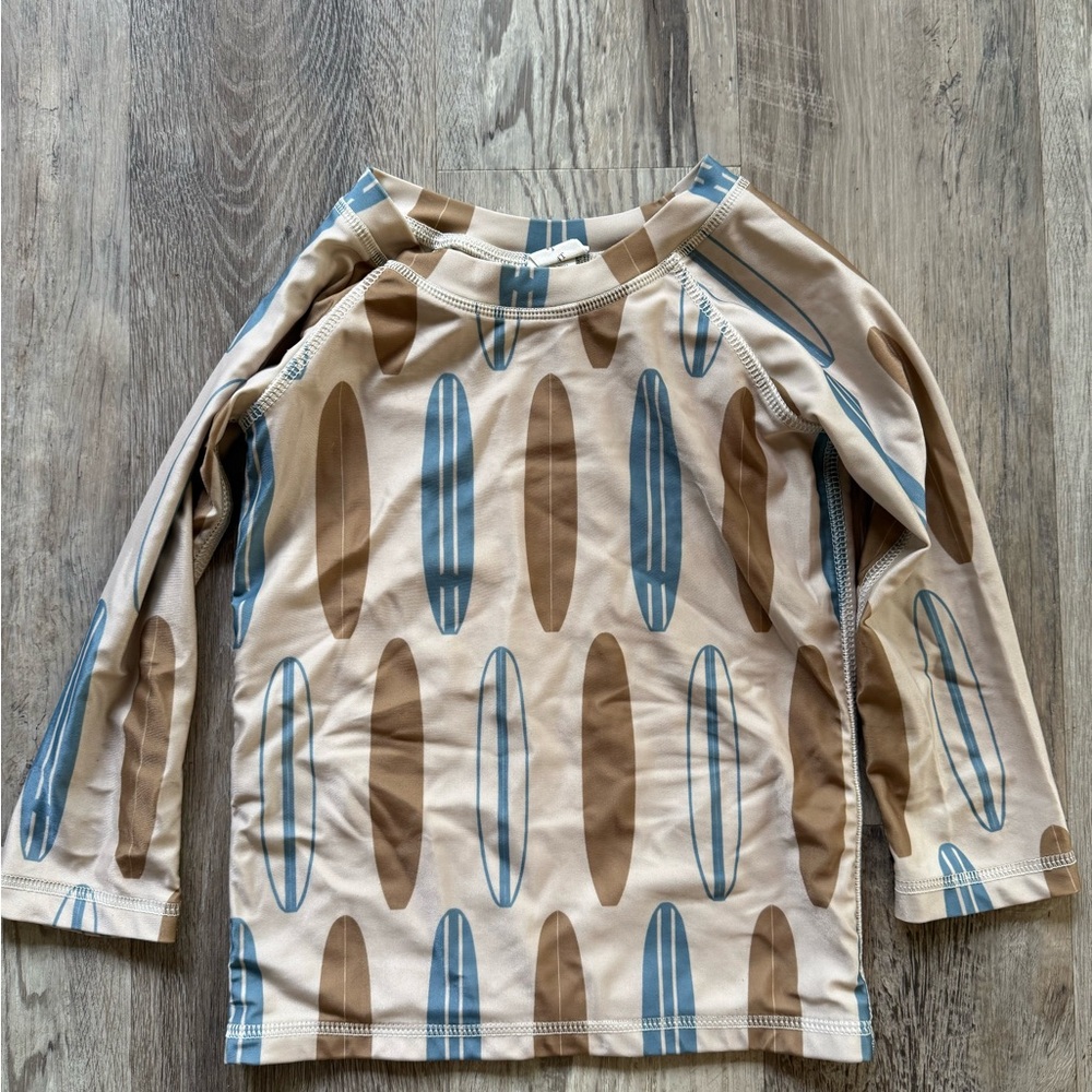 Kate Quinn Blue and Brown swim rash guard Shirt